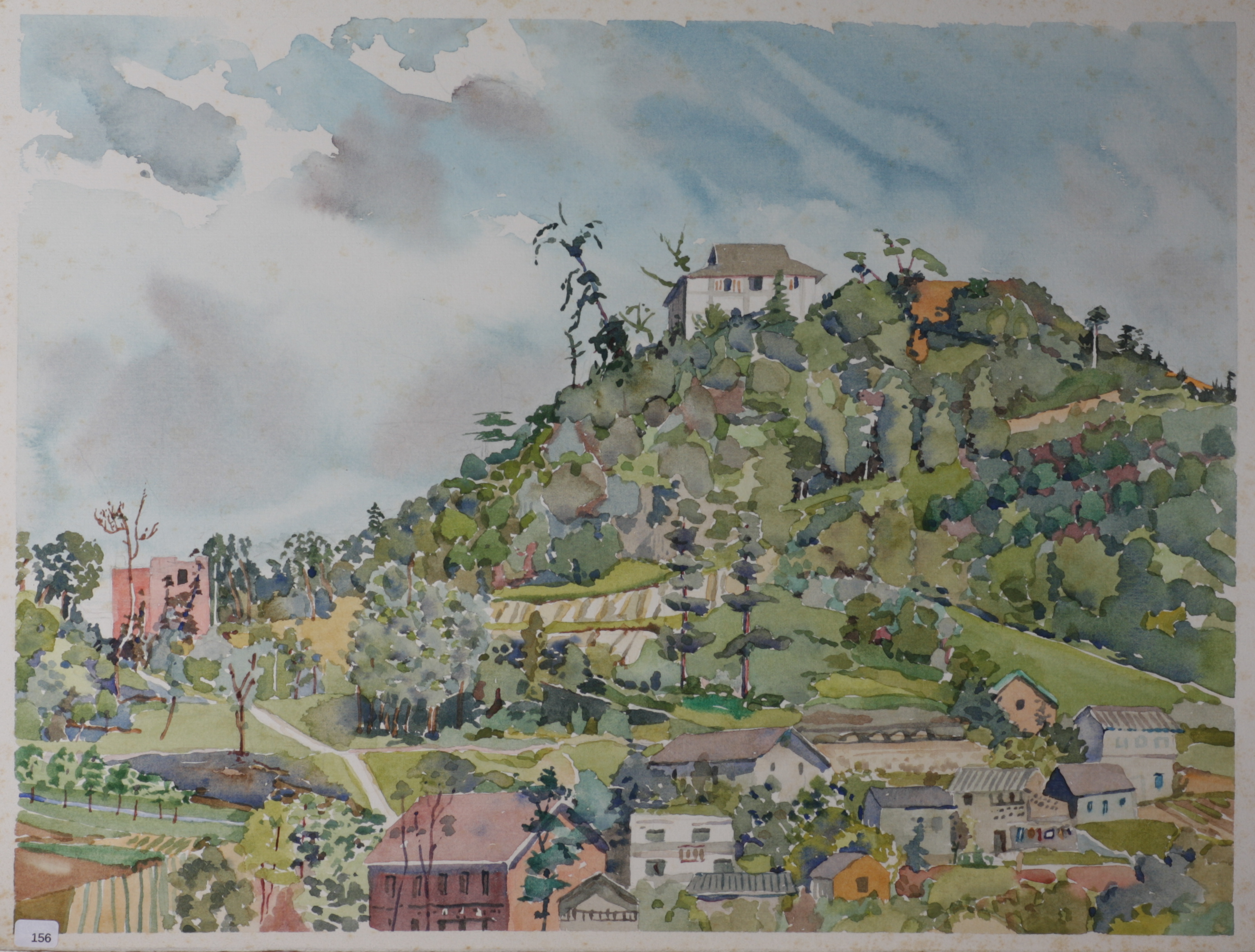 Picturesque houses on wooded hill