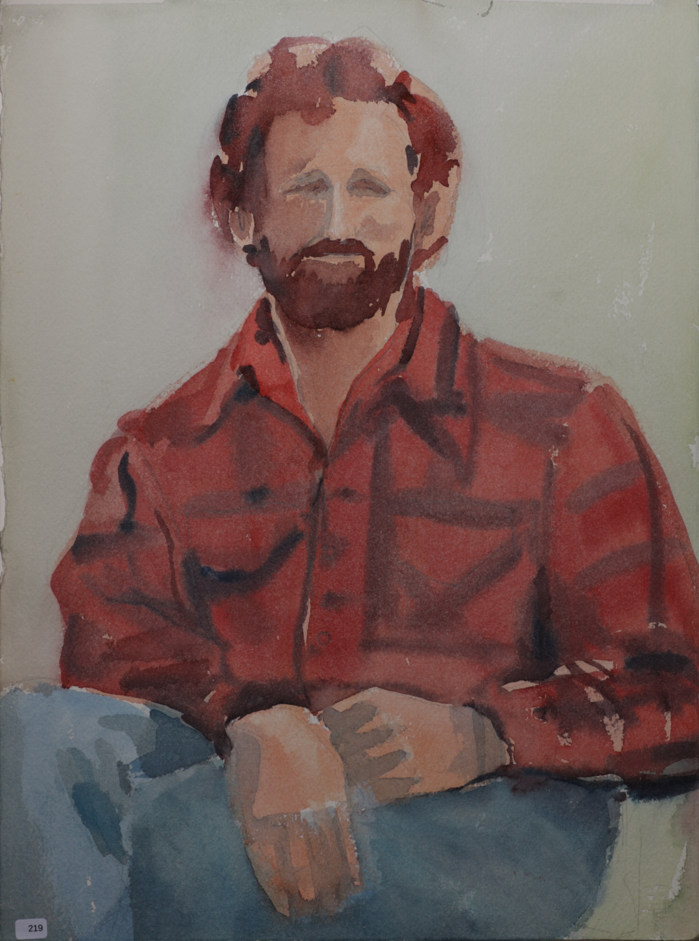 Man, bearded, wearing red plaid shirt