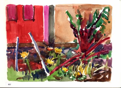 Garden study with red wall, flowering plants, and large red-green foliage.