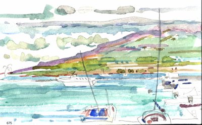 Maui, Harbor with sailboats and green hillside beyond turquoise water.