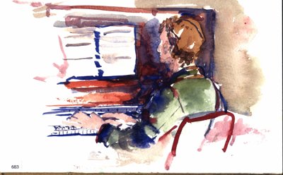 Tom seated at piano.