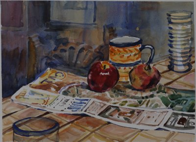 Still life: Apples, mug, map of TAOS