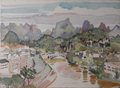 Yangshuo: Bridge over Li River, town, forest, mountains