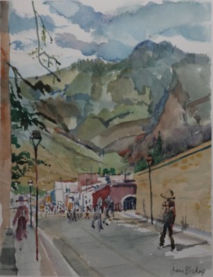 Street, green mountains